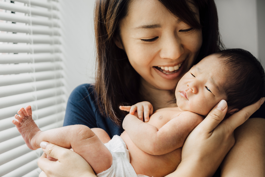 A10-day old Japanese newborn baby girl and her mother